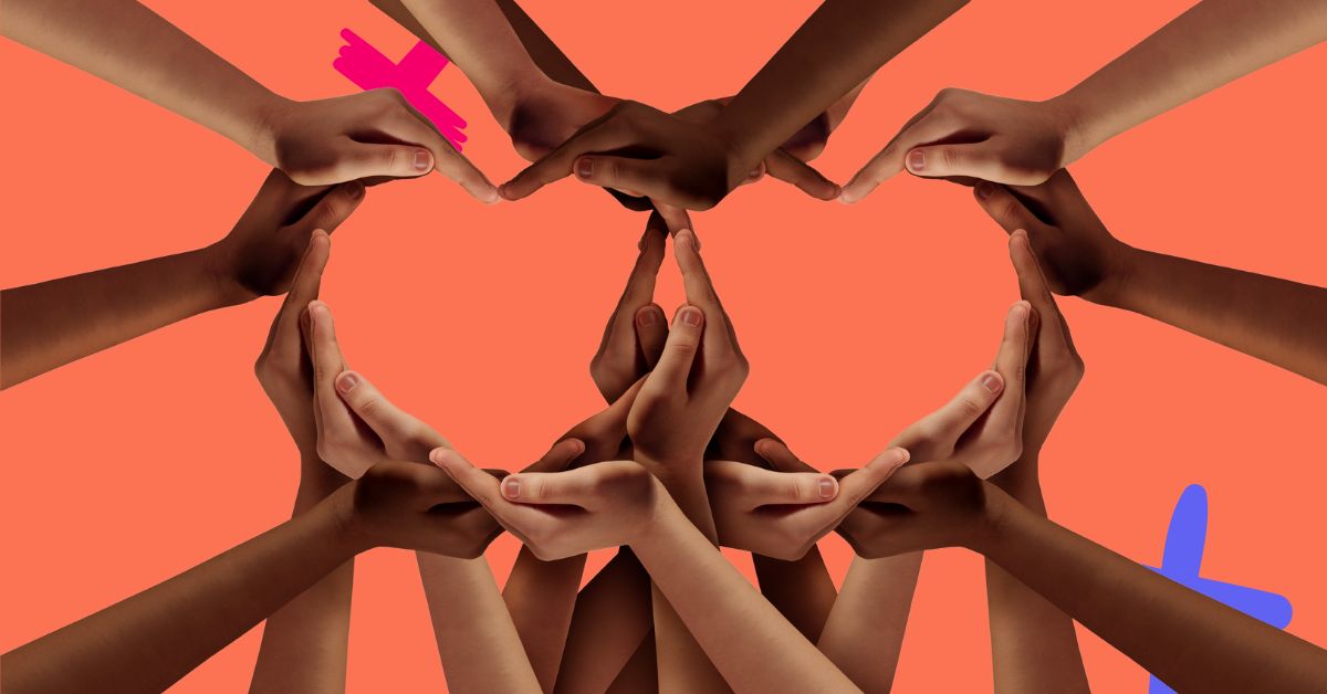 Many hands forming a heart to represent diversity in the healthcare workforce.