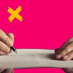 Person writing a contract to represent the locum tenens contract.