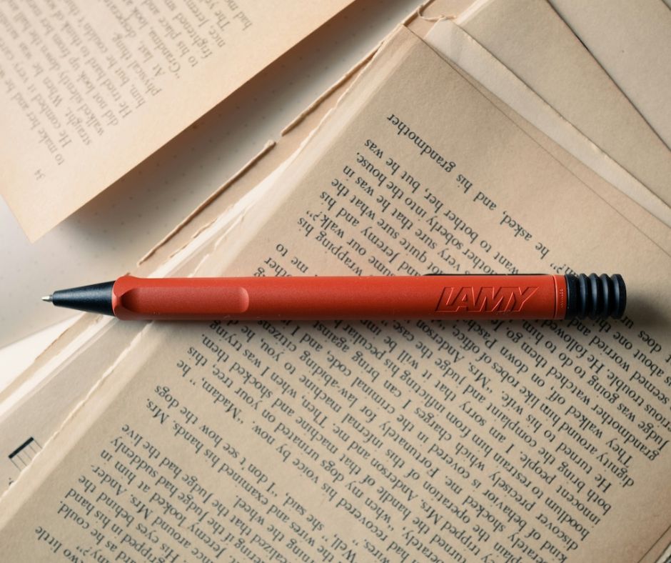 Lamy pen on top of a book.
