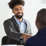 Locum tenens recruiter shaking hands with a candidate.