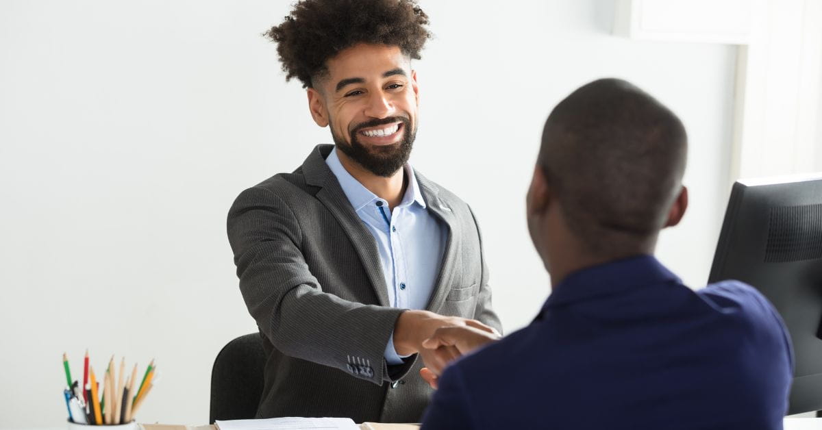 Locum tenens recruiter shaking hands with a candidate.
